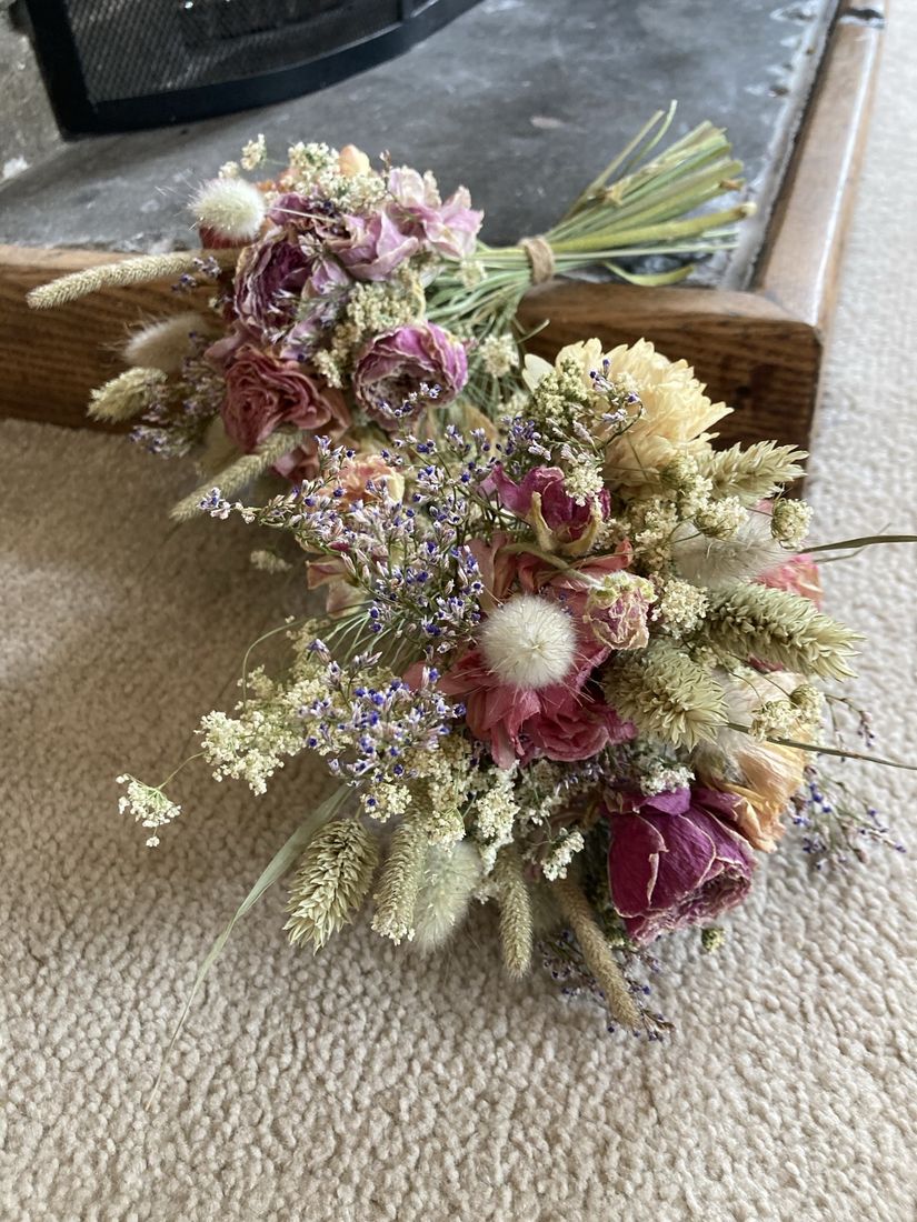 A dried flower bridal bouquet on a table